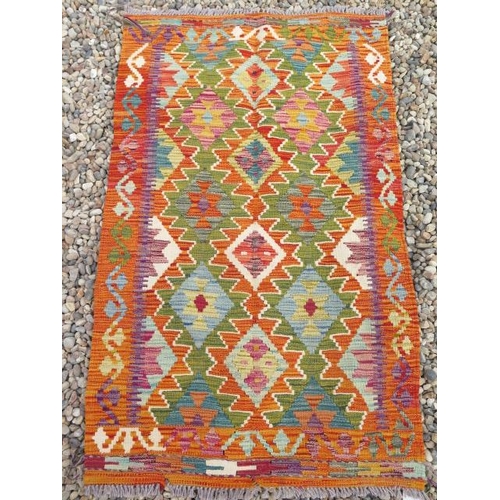 191 - A hand knotted woollen Chobi Kilim rug, 127cm x 78cm