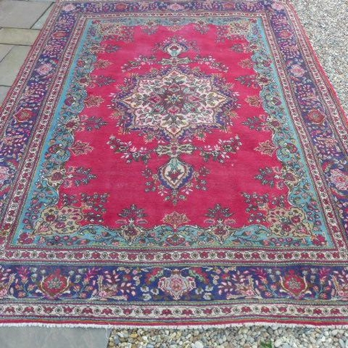 200 - An Azerbaijan hand knotted semi antique hand knotted run with a red fireld - 345cm x 248cm