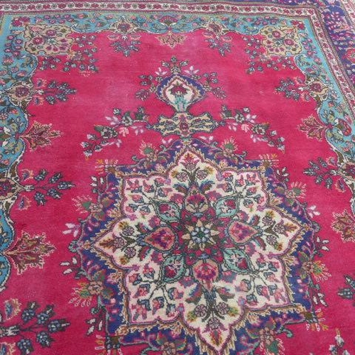 200 - An Azerbaijan hand knotted semi antique hand knotted run with a red fireld - 345cm x 248cm