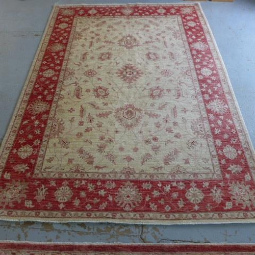 201 - A Ziegler hand knotted woollen rug 8'10