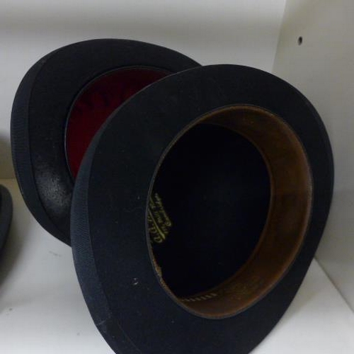 244 - A top hat size 7 1/4, two bowler hats and a modern Pith helmet size 59