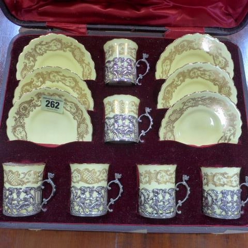 262 - A Royal Worcester boxed yellow ground set of six tea cups and saucers with silver holders - all good... 