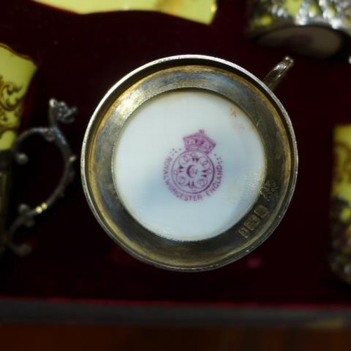 262 - A Royal Worcester boxed yellow ground set of six tea cups and saucers with silver holders - all good... 