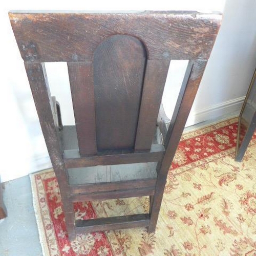 68 - A 17th century and later oak armchair with carved panelled back - Height 106cm x Width 53cm - with g... 