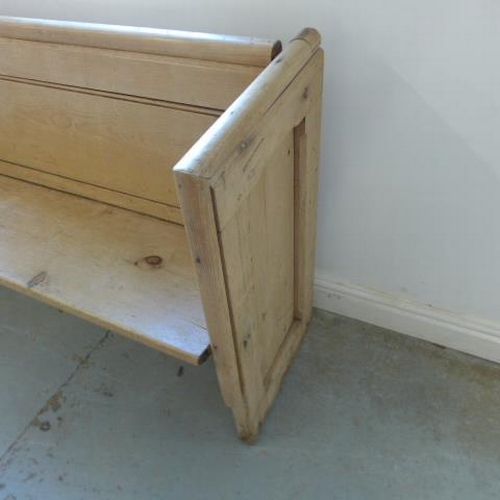 73 - A Victorian stripped pine pew ideal as a window seat or kitchen dining - Height 81cm x 153cm x 42cm