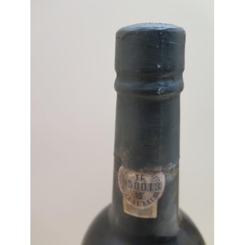 499 - A 75cl bottle of Taylors 1977 Vintage Port - seal good