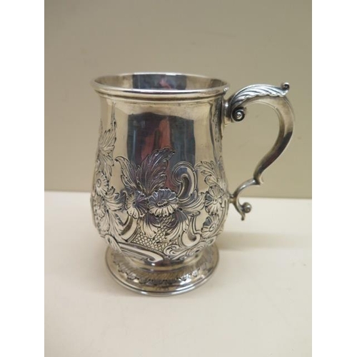 501 - An embossed silver tankard London 1895/96 Ackroyd Rhodes - Height 12cm - approx weight 12.36 troy oz... 