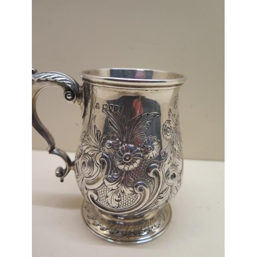 501 - An embossed silver tankard London 1895/96 Ackroyd Rhodes - Height 12cm - approx weight 12.36 troy oz... 