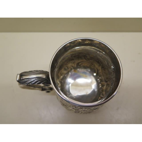 501 - An embossed silver tankard London 1895/96 Ackroyd Rhodes - Height 12cm - approx weight 12.36 troy oz... 