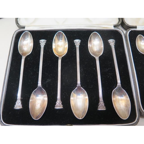 506 - Two boxed sets of silver tea and coffee spoons, a silver child's spoon, a pair of silver napkin ring... 