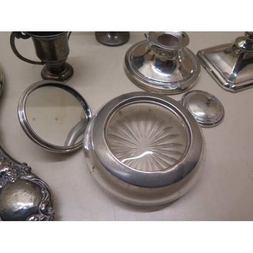 510 - Two silver cups approx 1.9 troy oz - one handle missing - two silver top glass pots, a silver back m... 