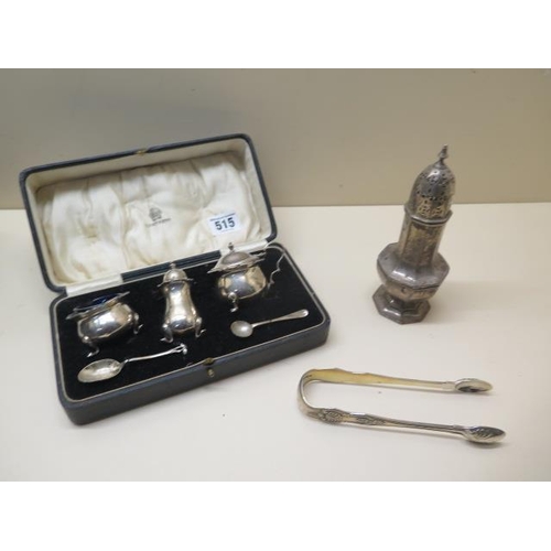 515 - A silver caster, silver sugar nip and a boxed silver cruet - total silver approx 8.6 troy oz