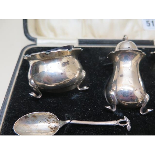 515 - A silver caster, silver sugar nip and a boxed silver cruet - total silver approx 8.6 troy oz