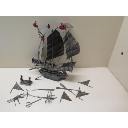 516 - An Oriental white metal gun boat with loose pieces - total weight approx 6 troy oz - with wooden bas... 