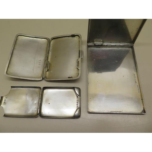 519 - Two silver cigarette cases and a match folder case - total weight 9.2 troy oz