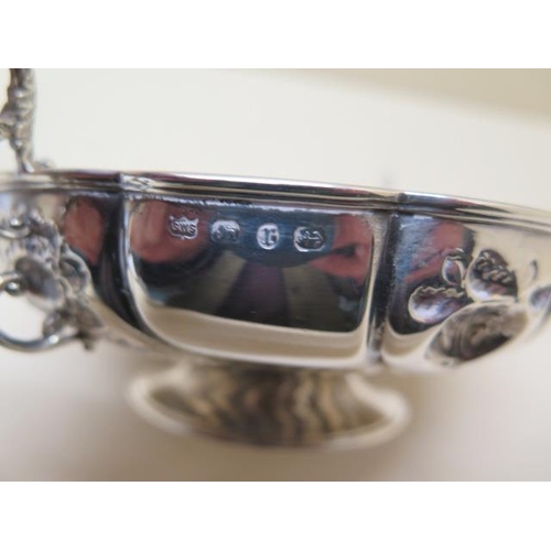 521 - An embossed silver twin handled bowl Birmingham 1891/92 SWS - width 17cm - approx weight 4.2 troy oz... 