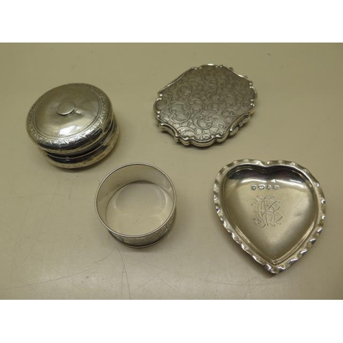 532 - A silver lidded pot, a silver napkin ring, a silver heart dish and an Alpacca compact, weighable sil... 