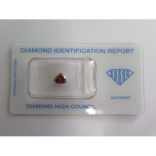 A trilliant cut 1.00ct fancy intense orangy brown single stone diamond - 5.8mm x 6.71mm x 3.92mm - with Hoge Raad Voor Diamant VZW certificate