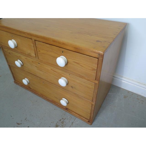 99 - A Victorian pine four drawer chest in varnished finish - Height 60cm x 87cm x 44cm