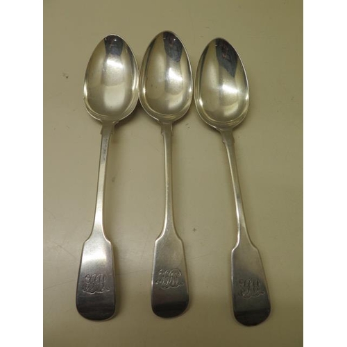 522 - A set of three fiddle pattern table spoons, London 1843 WE, monogram, good condition, approx weight ... 