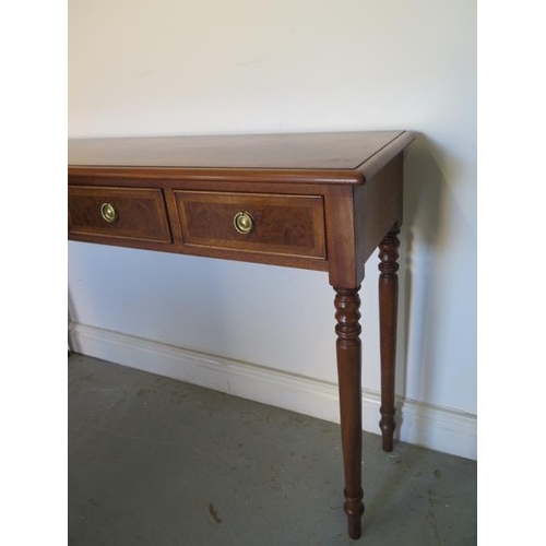44 - A walnut four drawer hall table on turned legs made by a local craftsman to a high standard  - Heigh... 