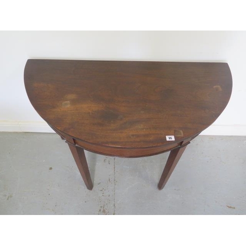 53 - A 19th century mahogany demi  lune side table - Height 72cm x 107cm x 52cm