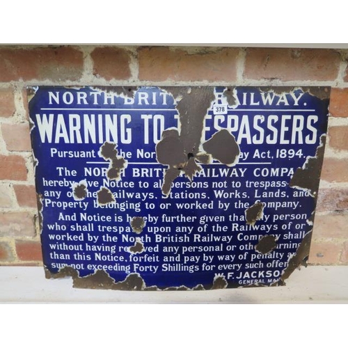 225 - A North British Railway Warning to Trespass enamel sign - 50cm x 69cm - worn condition