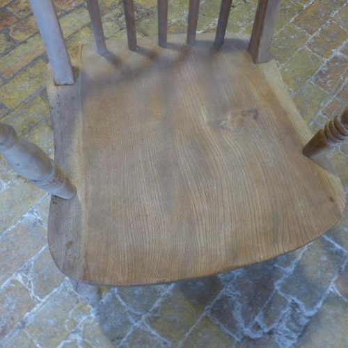 12 - A Victorian stick back ash/elm armchair