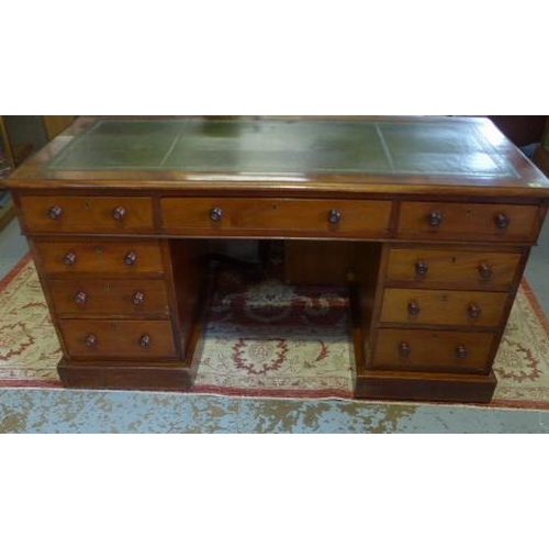 16 - A good Victorian mahogany nine drawer twin pedestal desk with leather inset top - some fading to bac... 