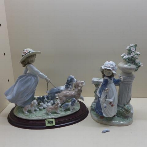 209 - A Lladro group Girl in bonnet walking dogs and puppies, Puppy Parade on a base 27cm tall, minor foli... 