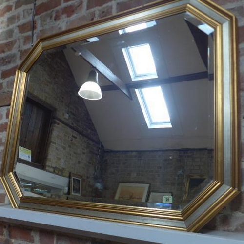 26 - A gilt framed wall mirror - 90cm x 116cm