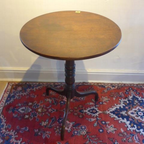 32 - A Georgian mahogany tilt top side table on a turned colomn and downward splayed tripod base - Height... 