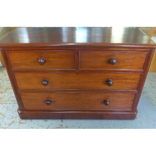 65 - A Victorian mahogany and oak lined chest of two over two drawers on a plinth base and bun handles - ... 