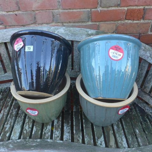 73 - Four frost proof Sicilia planters - Height 25cm