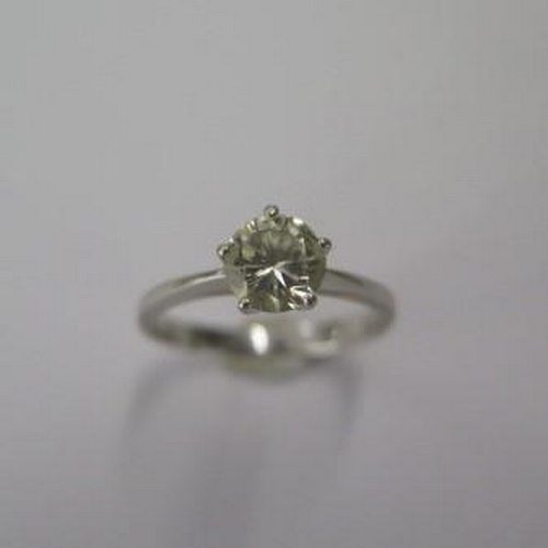 424 - An 18ct white gold solitaire diamond ring, approx 0.50 ct, size K/L, approx 2.2 grams, some small ma... 