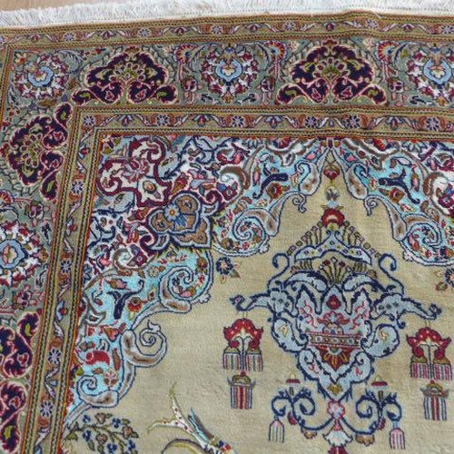 135 - A hand knotted woollen fine Qom, silk inlaid rug - 2.22m x 1.34m