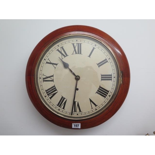 107 - A 12 inch dial wall clock with 8 day spring movement - in running order