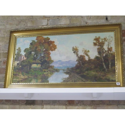 151 - An oil on canvas Lake Scene signed J P Gian.... in a gilt frame - frame size 63cm x 113cm