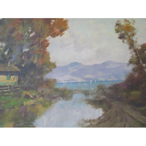 151 - An oil on canvas Lake Scene signed J P Gian.... in a gilt frame - frame size 63cm x 113cm