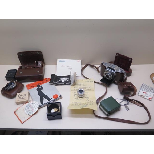 205 - Zeiss Ikon Compur - Rapid shutter 35 Ikonta camera with attachments etc and original receipt dated 1... 