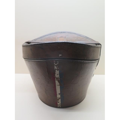 206 - A Victorian leather top hat box in polished condition, brass lock operates by pushing lock pin downw... 