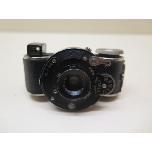 208 - A Minifex miniature spy camera for 16mm rollfilm, 13mm x 18mm fitted with a Vidar lens F:25MM F/3.5-... 