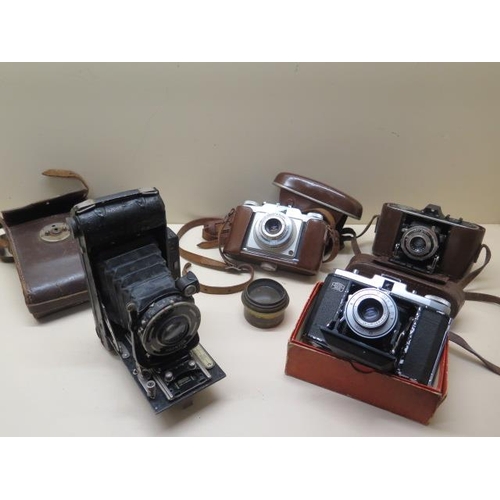 209 - Four vintage cameras - Ensign Autorange, Zeiss Ikon, Agfa Memo and a Silette