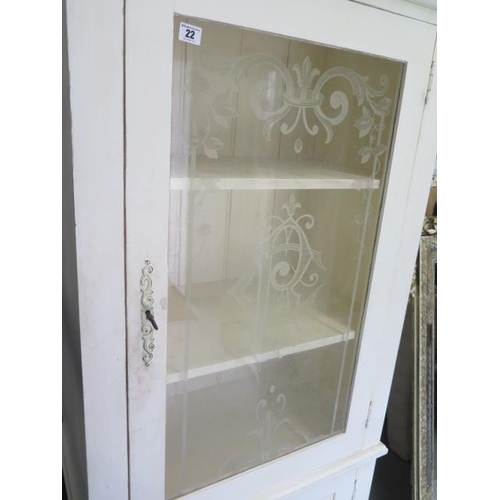 22 - A painted shabby chic cupboard with a glazed door above a panelled door - Height 185cm x 84cm x 47cm
