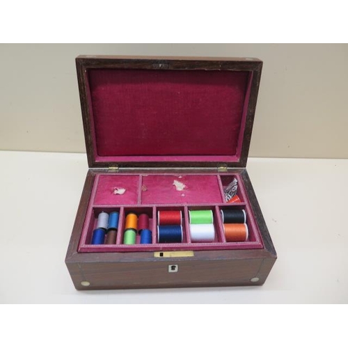 227 - A rosewood sewing box and contents - Width 23cm