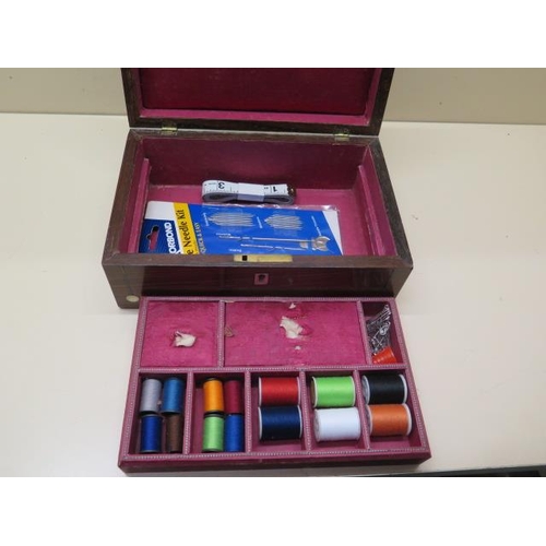 227 - A rosewood sewing box and contents - Width 23cm