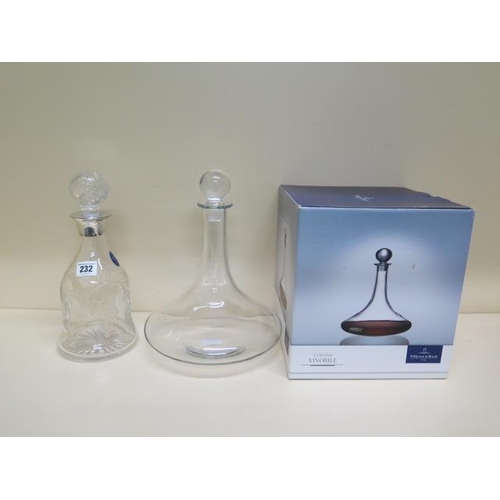 232 - A Villeroy & Boch Vmobile decanter boxed - Height 30cm - and a Camelot crystal etched glass decanter... 