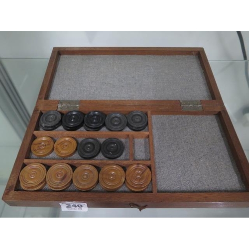 240 - An inlaid mahogany folding chess/draughts board box with a set of bakelite draughts - Size open 30cm... 