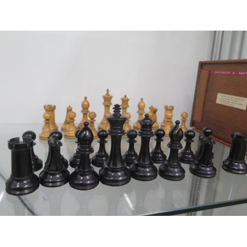 241 - A good early 1900 boxwood Staunton pattern chess set with mahogany box inscribed 1904 on inside lid ... 