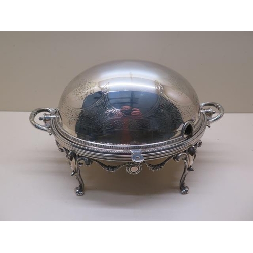 323 - A silver plated oval fold over breakfast/bacon serving dish - Width 34cm